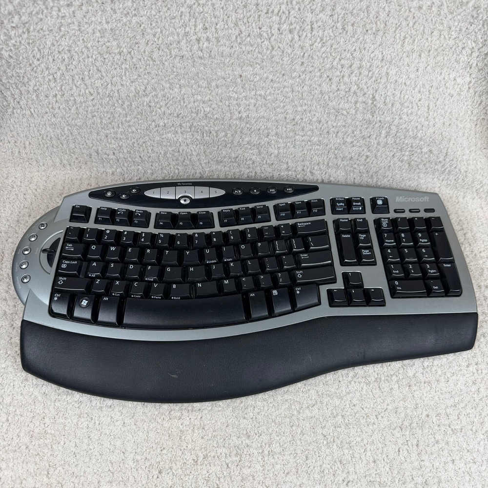 Microsoft Wireless Comfort Keyboard 4000 Ergonomic USB Model 1045 Silver Black‎